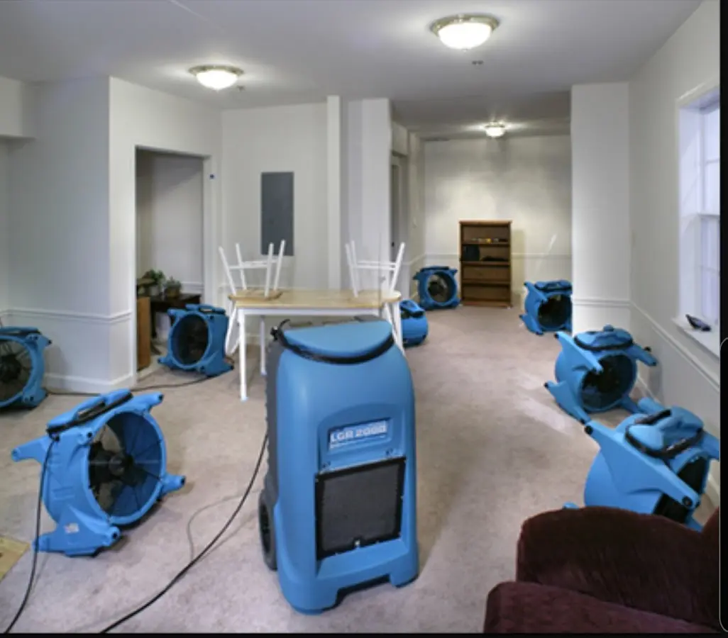 Air movers and dehumidifier setup for Water Extraction & Removal in Hampstead